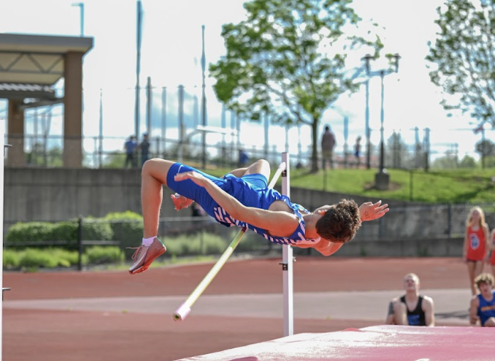 Spencer Villarreal (11) attempts a 5 foot and 10 inch jump in high jump. 